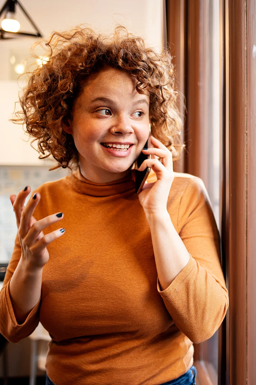 Person on the phone talking about addiction resources