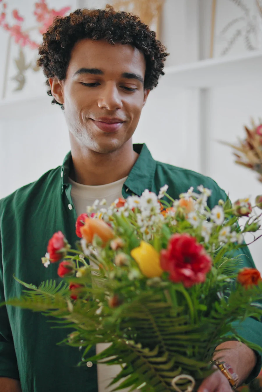 Person appreciating flowers after their co-occurring disorders treatment session