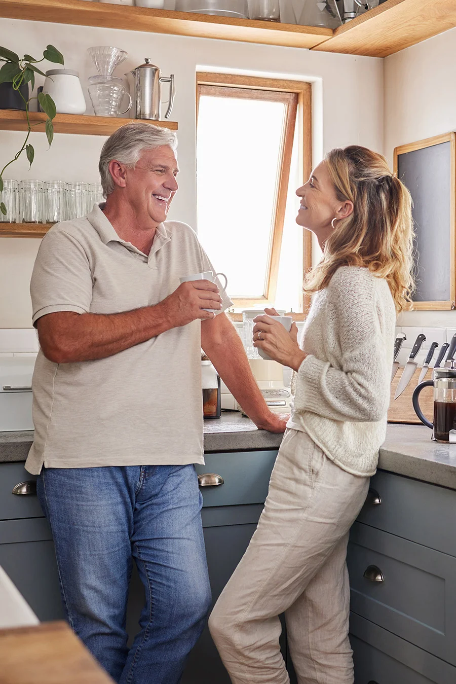 Two people in kitchen talking about medical detox