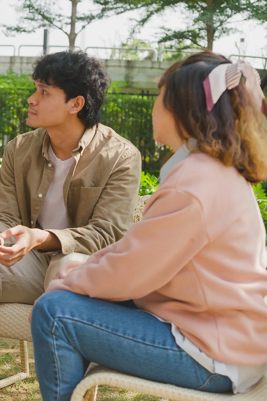 Two people in group setting learning about medication-assisted treatment