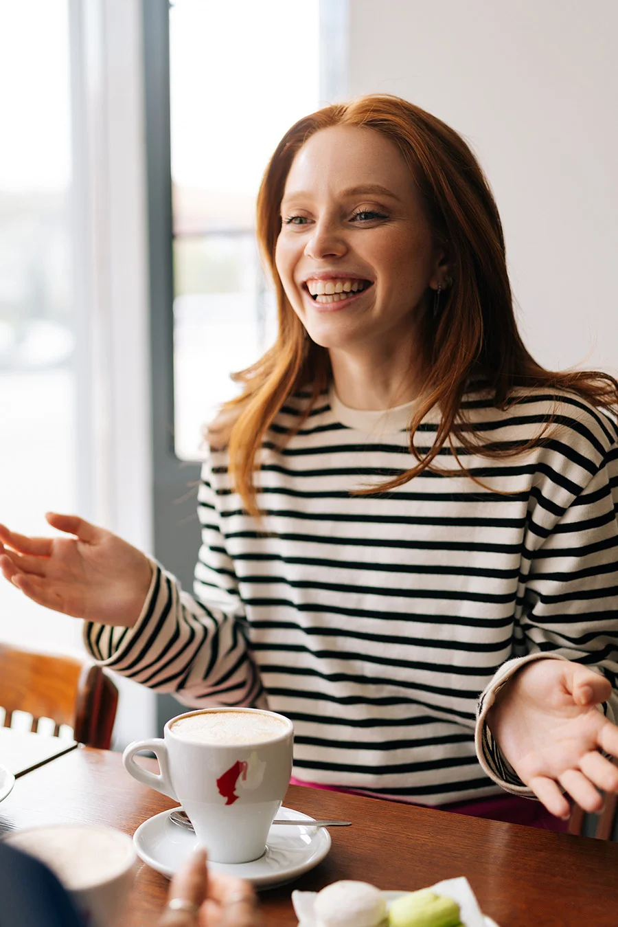 Person enjoying a beverage while talking about what to expect in rehab